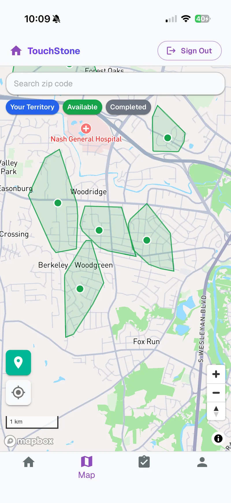The canvasser app's live map with open territories drawn over a neighborhood, filterable by your territory, available, and completed
